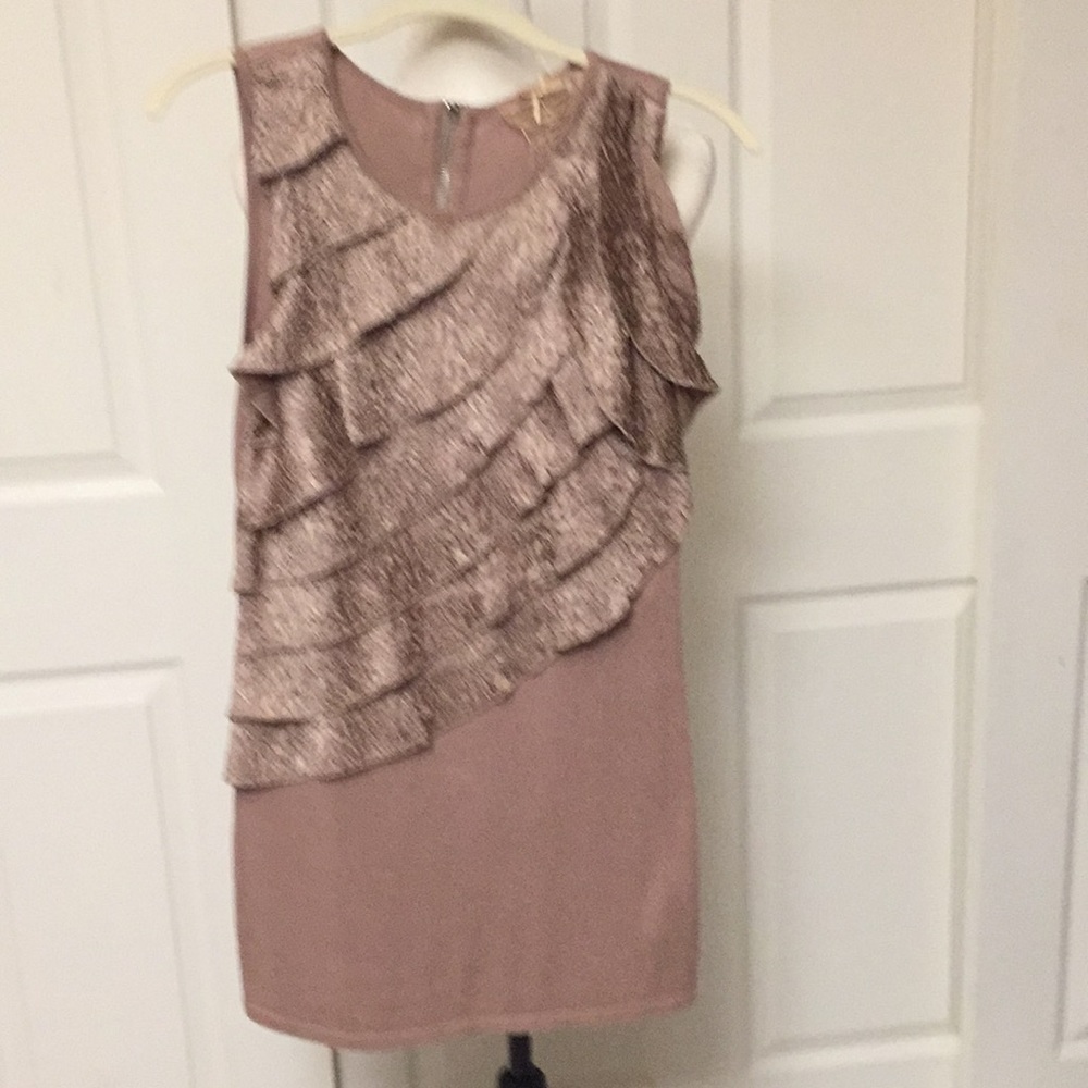Hi end boutique top with lots of style